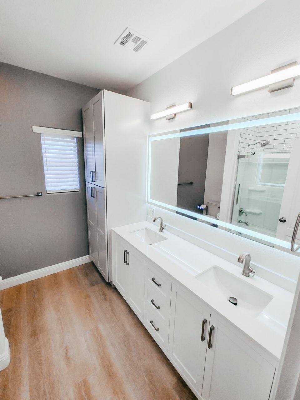 Master bath vanity and linen cabinet remodel by Arc Property Services