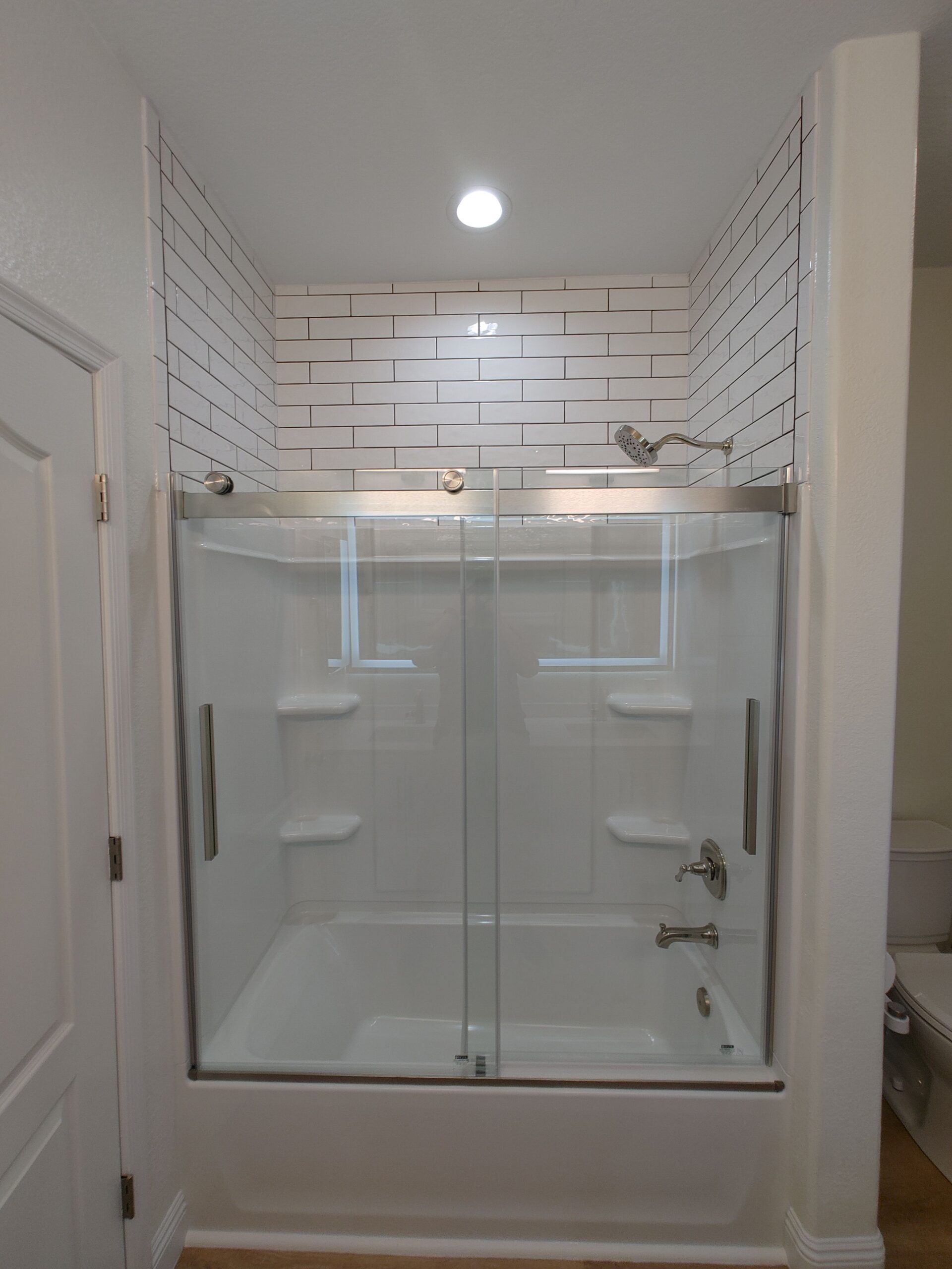 Master bath tub and tile remodel by Arc Property Services