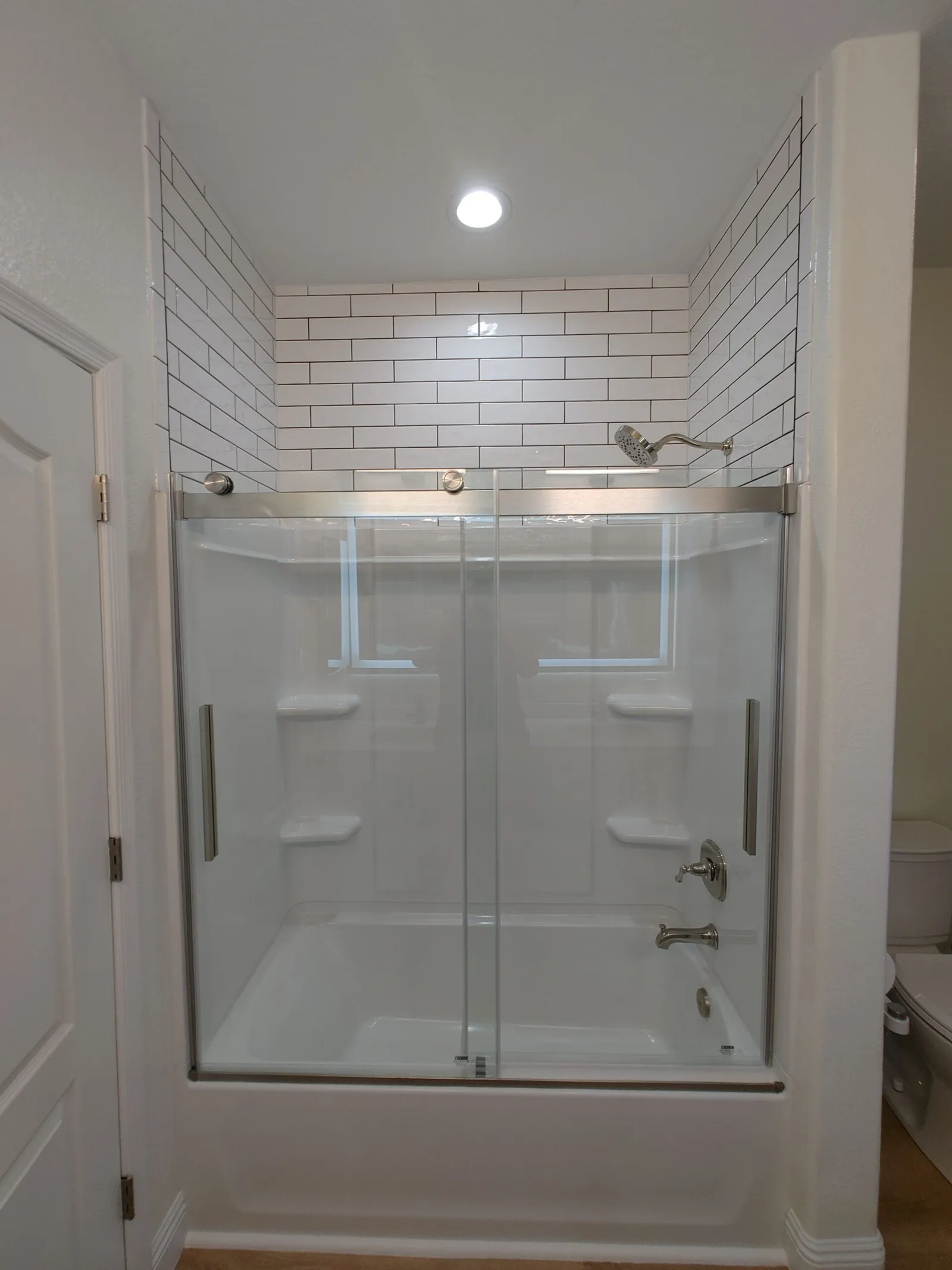 Master bath tub and tile remodel by Arc Property Services