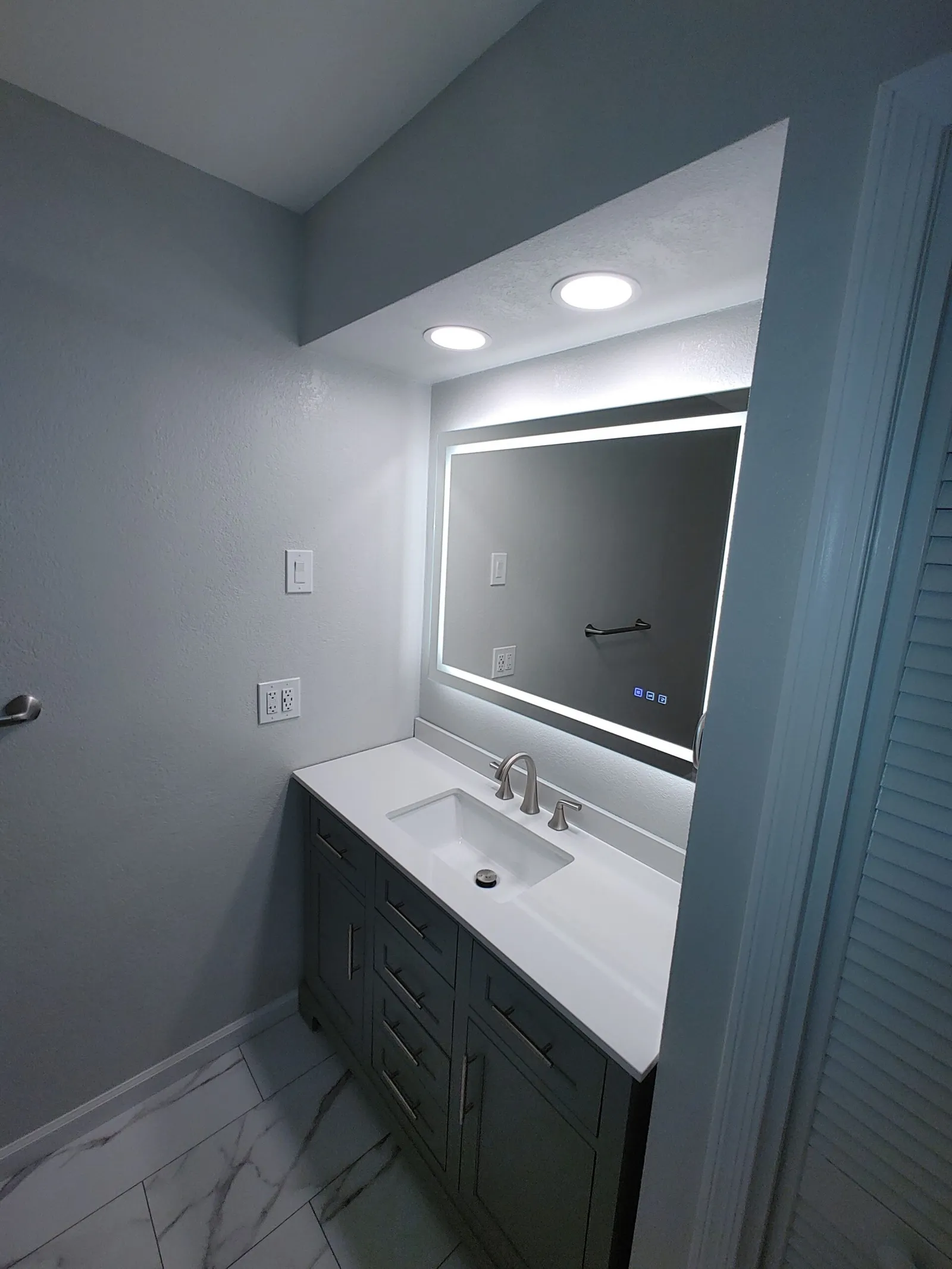Hall bath vanity remodel by Arc Property Services