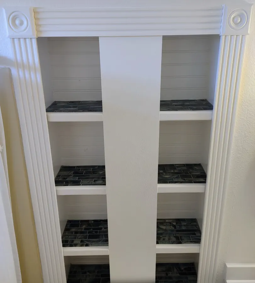 Built-in shelving with tile accents, White Mountains, AZ