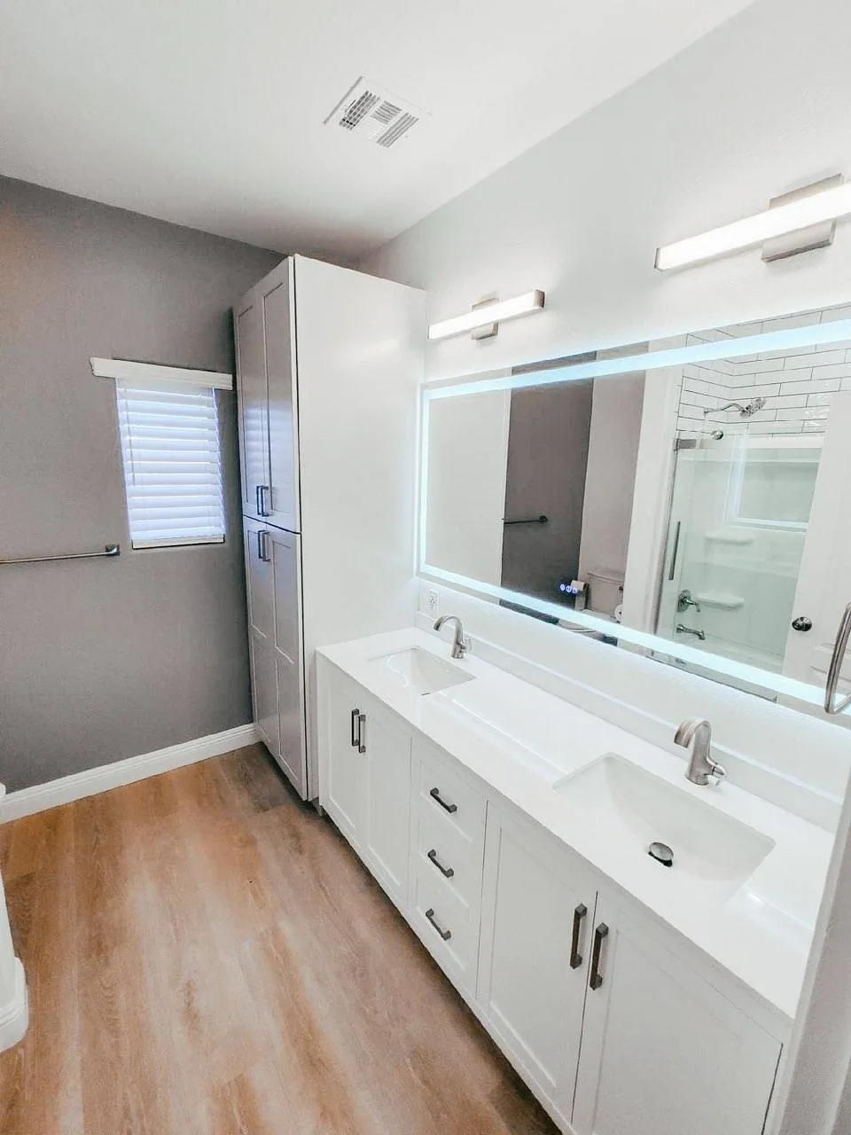 Master bath vanity and linen cabinet remodel by Arc Property Services