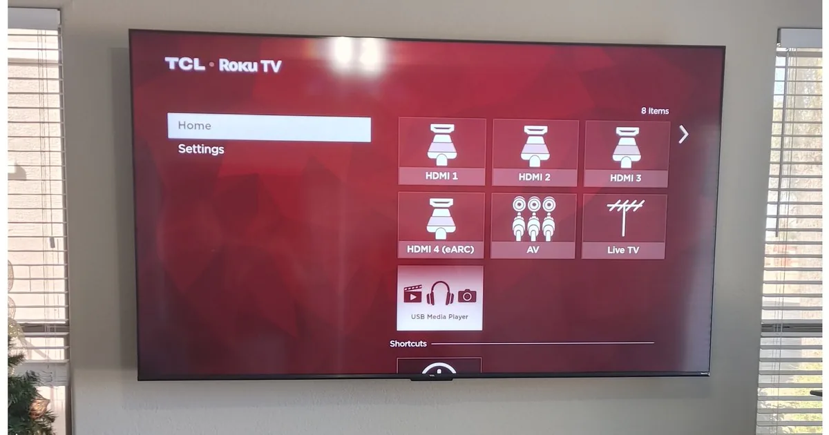 Large TV wall mounted with no visible wires by Arc Property Services in Pinetop-Lakeside, AZ